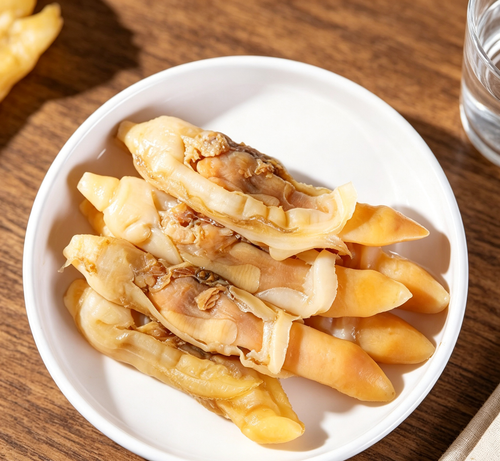Close view of golden-brown abalone slices